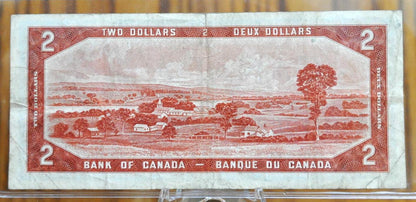 1954 Bank of Canada 2 Dollar Banknote - Devil's Hair Note - Coyne / Towers Signatures - 1954 Canadian Two Dollar Devil Face Note - P#67a