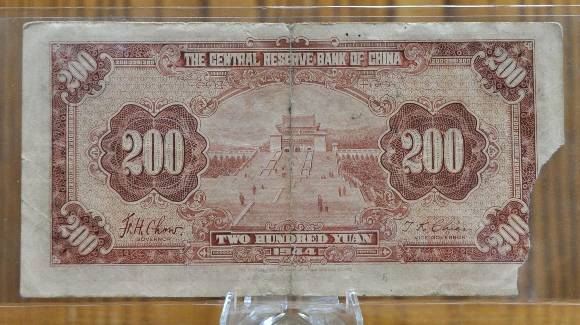 1944 Central Reserve Bank of China 200 Yuan Note - Corner Tear - Sun Yat-Sen Issue - 1944 Chinese Two Hundred Yuan Bank Note - P#J30