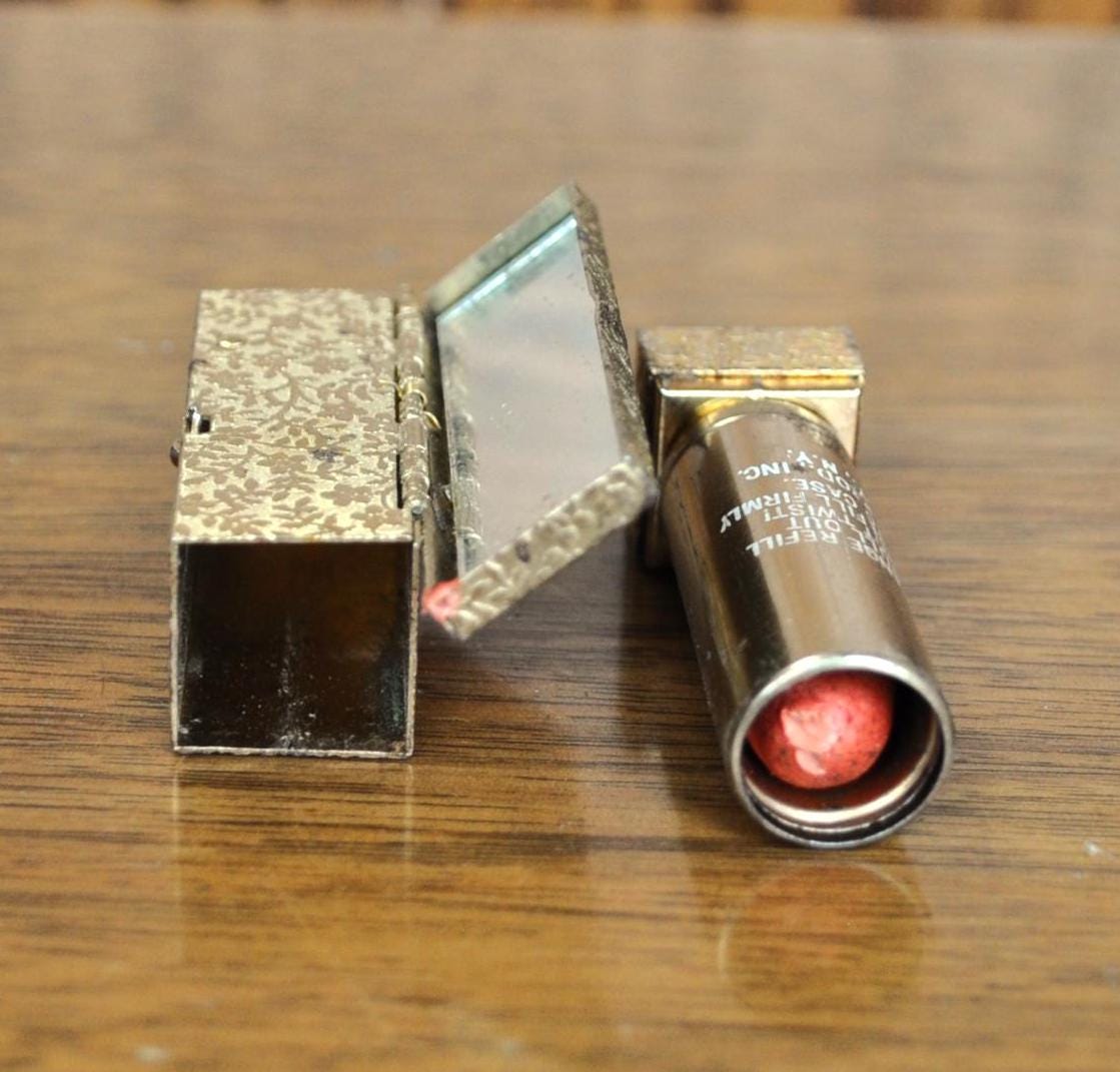 Vintage Avon Refillable Gold Tone Floral Lipstick Compact - With Lipstick, Tender Amber - 1950s Gold Tone Compact Mirror Lipstick Holder