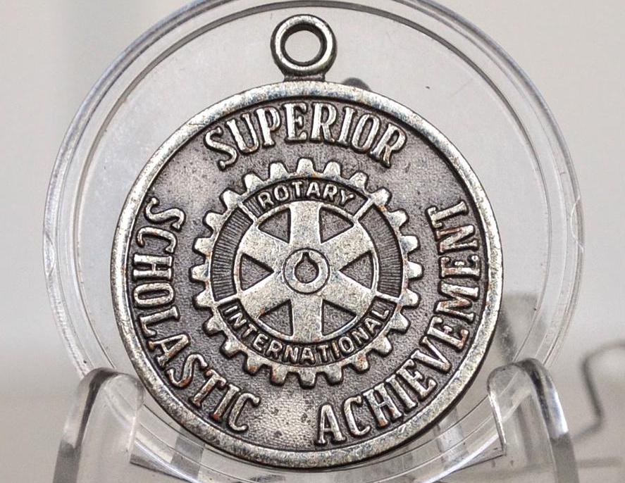1985 Rotary International Merit Token for Superior Scholastic Achievement - Rotary Class Sterling Metal Award