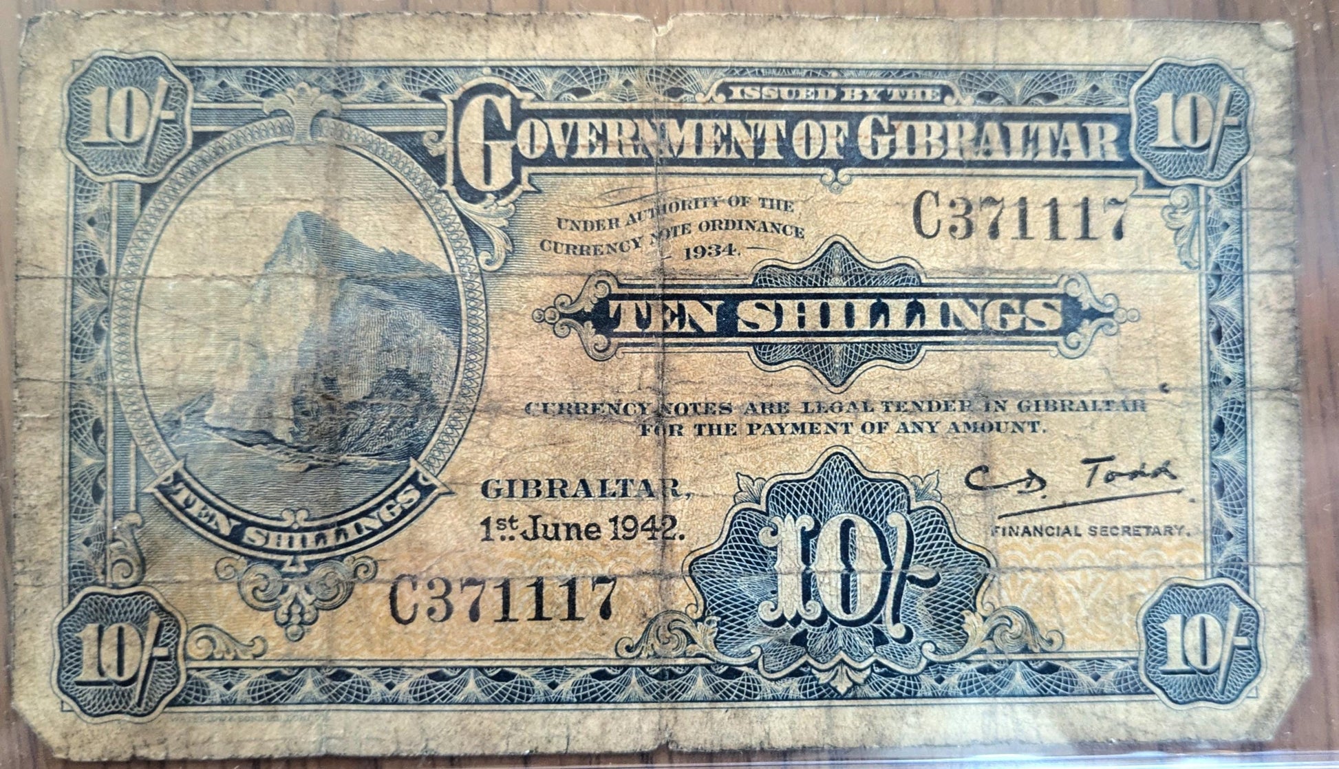 1942 Government of Gibraltar 10 Shillings Note - Financial Secretary Type - WW2 Dated Note - 1942 Gibraltar Ten Shillings Banknote - P#14b