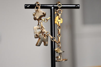 Intricate 12KT Gold Filled Charm Bracelet - 18 mm - Varying Charms - Letters, Instruments, Girls Scouts