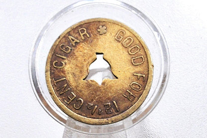 Hemenway and Moser Co., Ogden, Utah "Good For" 12 1/2 Cent Cigar Token with center cut bell shape - Brass Utah Token Hemenway and Moser Co.,
