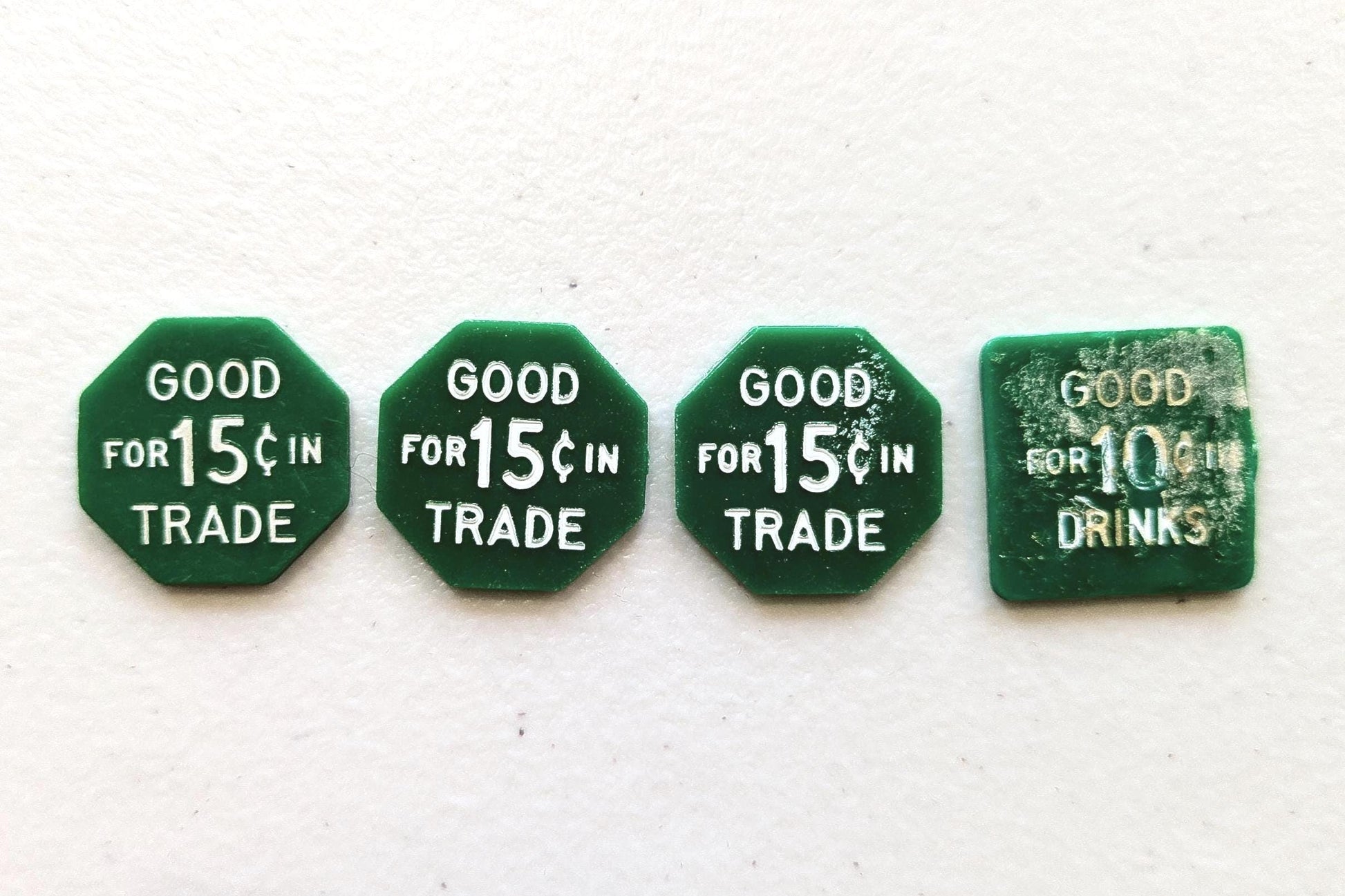 Lot of 4 Green Trade/Drink tokens - Square and Octagon Shaped Trade Tokens