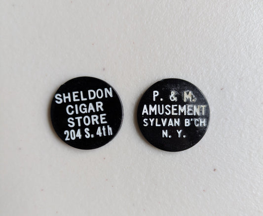 Lot of 2 Black Trade tokens - Two Black trade token lot