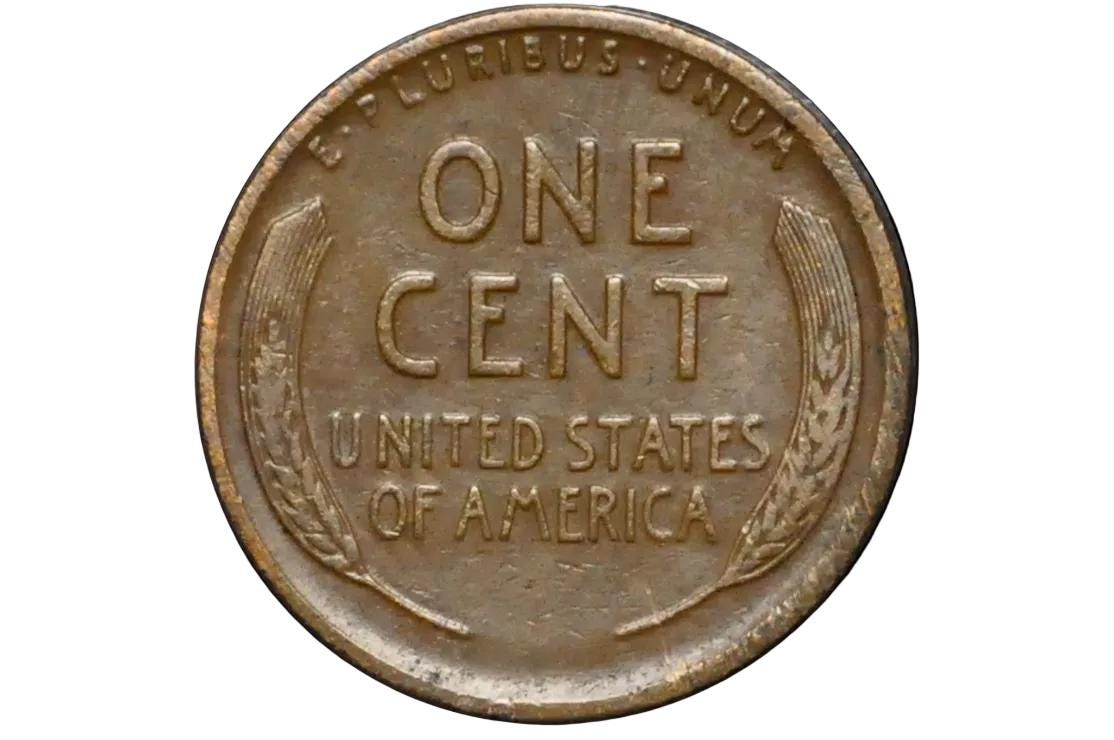 Vintage one cent coin from the United States on a black background