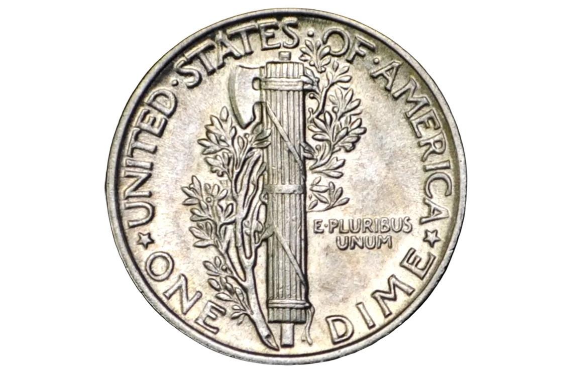 Silver dime coin with 'United States of America One Dime' text on a black background