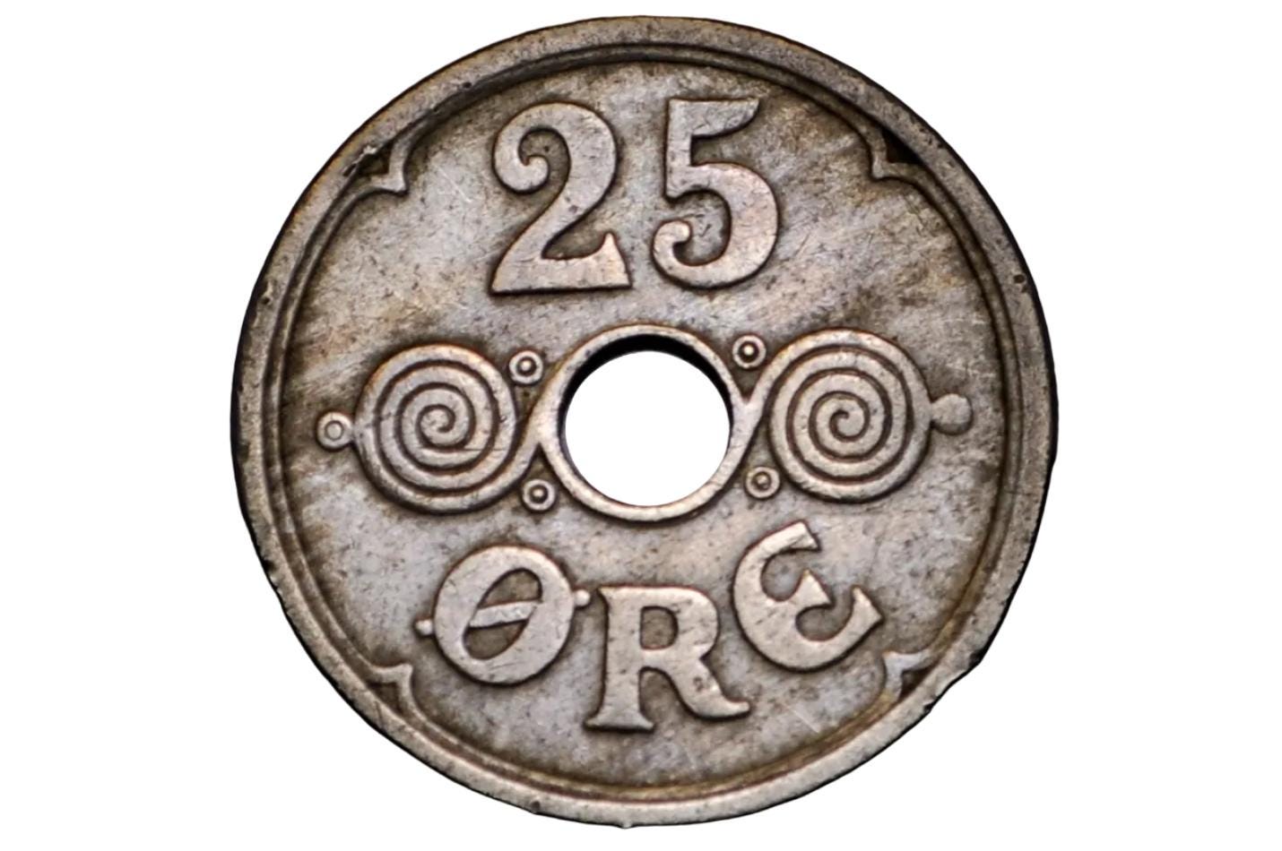 Vintage silver coin with '25 Ore' text on a black background