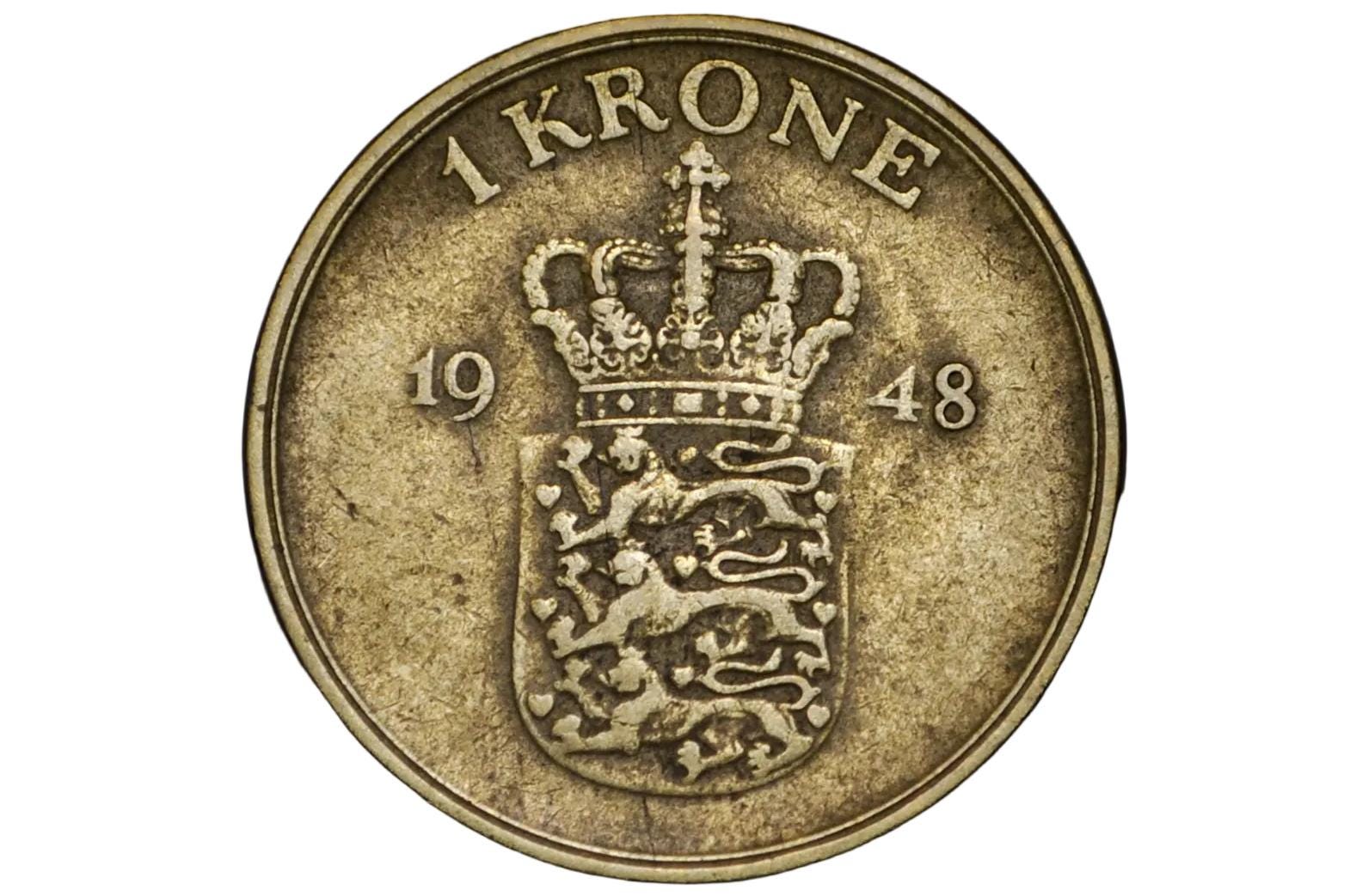 Vintage Norwegian krone coin from 1948 on a black background