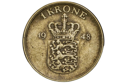 Vintage Norwegian krone coin from 1948 on a black background