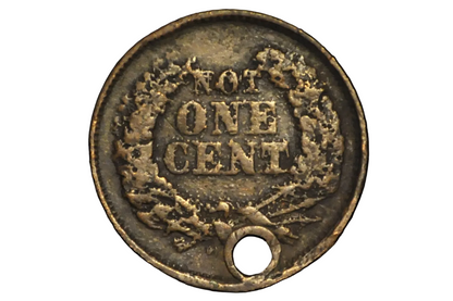 Bronze token with 'Not One Cent' text on a black background