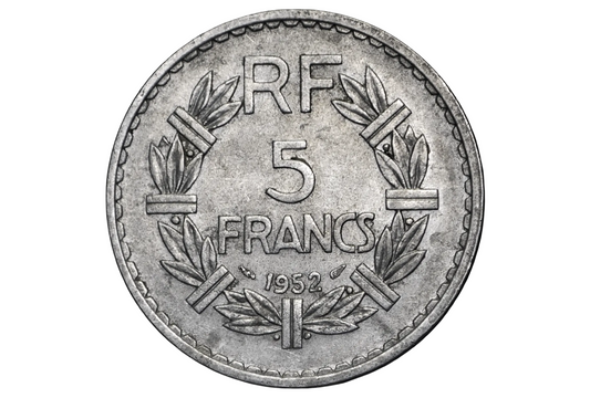 Silver French coin with 'RF 5 FRANCS 1952' text on a black background