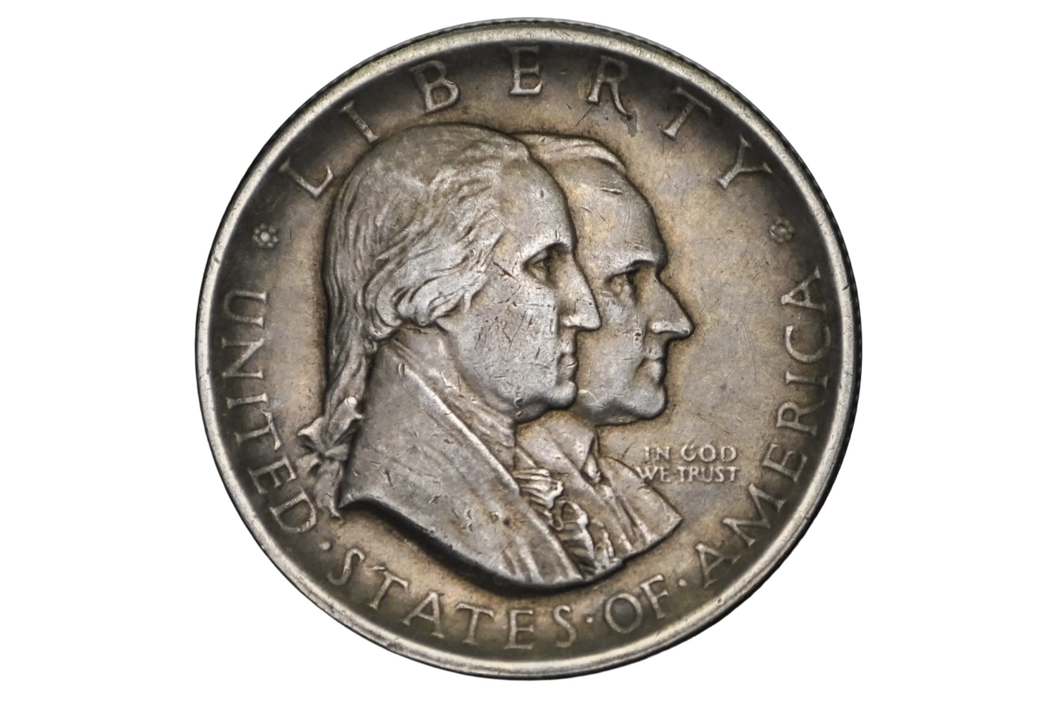 Silver coin with profiles of two individuals and 'Liberty' text on a white background. 1926 half dollar us coin in xf45 to au condition