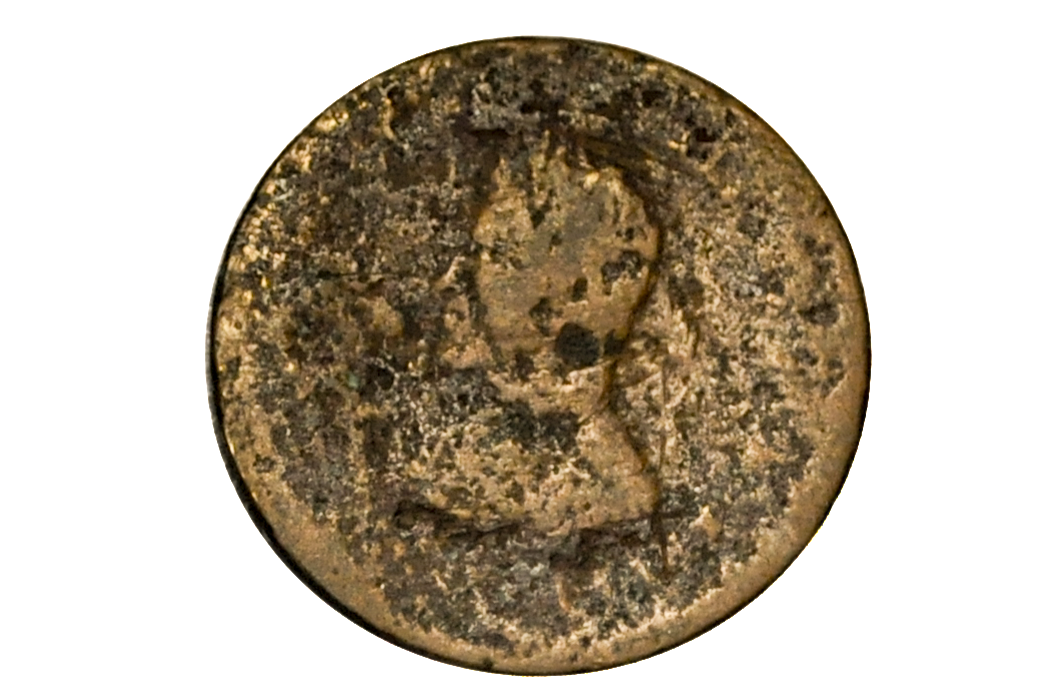Bronze civil war token with a portrait on a white background