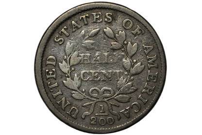 A close-up of a vintage United States half cent coin inside a clear plastic protective holder, showing the reverse side with the text 'UNITED STATES OF AMERICA', 'HALf CENT', and '1'/'200'