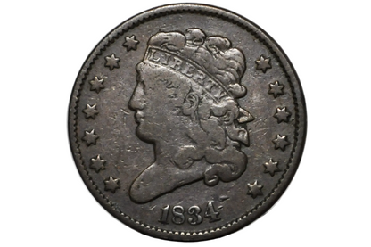 An antique 1834 United States coin featuring a left-facing profile of Liberty with a crown, surrounded by thirteen stars, displayed inside a clear plastic grading holder.