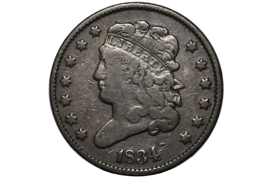 An antique 1834 United States coin featuring a left-facing profile of Liberty with a crown, surrounded by thirteen stars, displayed inside a clear plastic grading holder.