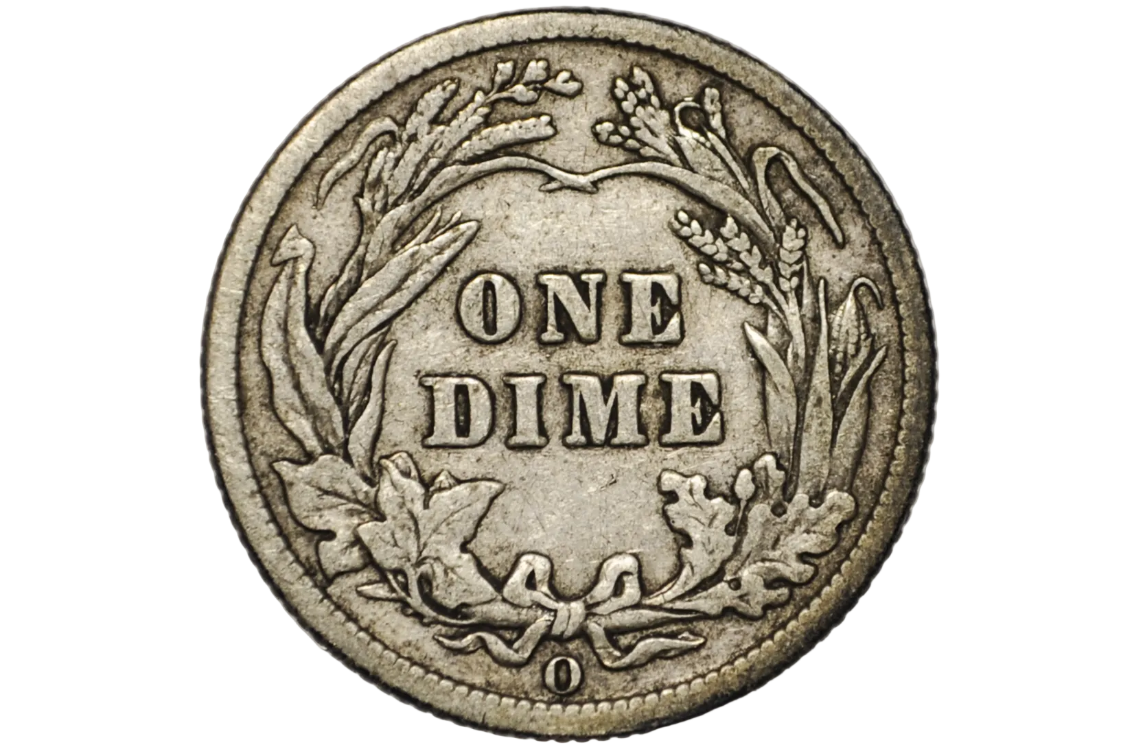A close-up of a vintage US one dime silver coin inside a clear plastic protective capsule, showing the detailed wreath design and 'ONE DIME' text.