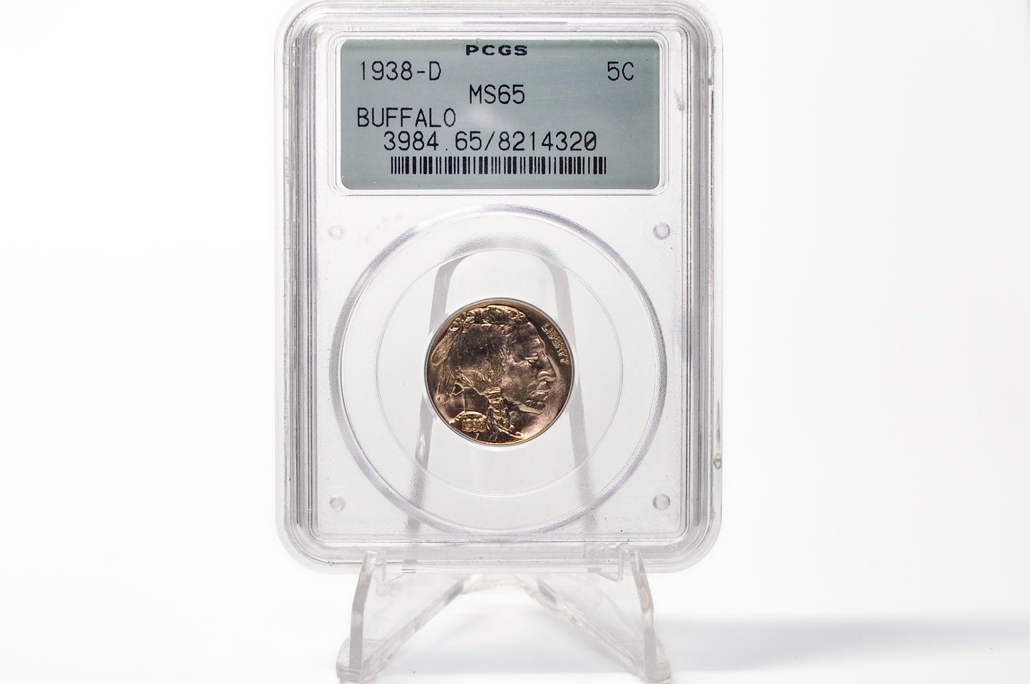 A 1938 Buffalo 5-cent gold coin encapsulated in a clear PCGS holder on a clear display stand, photographed against a white background.