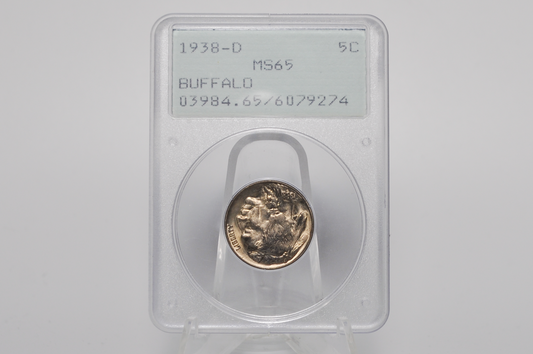 A 1938-D Buffalo nickel coin in a clear plastic grading holder with a white label, displayed on a clear stand against a light gray background.