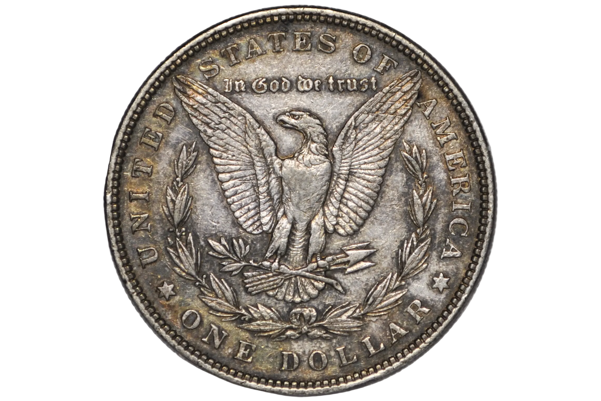 A vintage United States one dollar silver coin featuring the eagle design, displayed inside a clear plastic protective capsule against a neutral gray background.