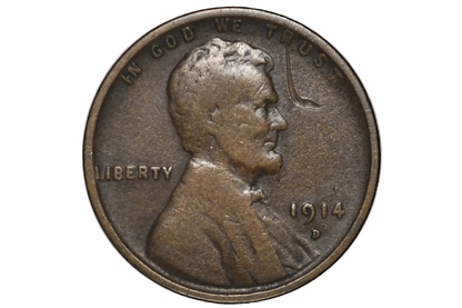A 1914 D US penny coin showing the Abraham Lincoln profile with 'IN GOD WE TRUST' and 'LIBERTY' inscriptions.