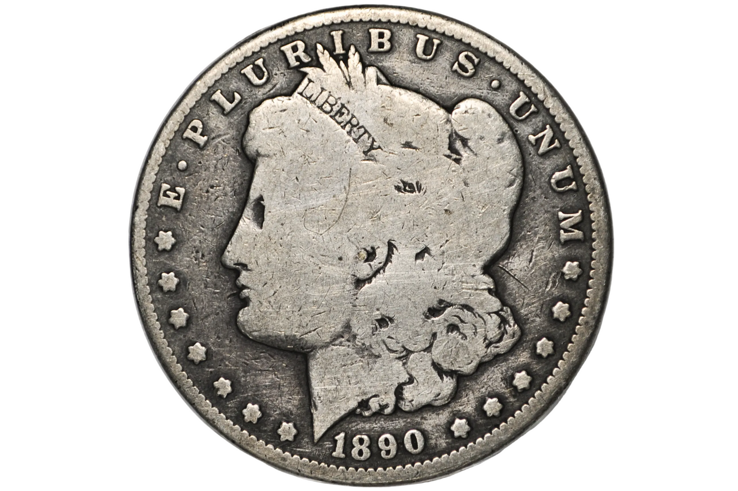 An 1890 Morgan silver dollar coin inside a clear plastic protective holder, shown against a white background.