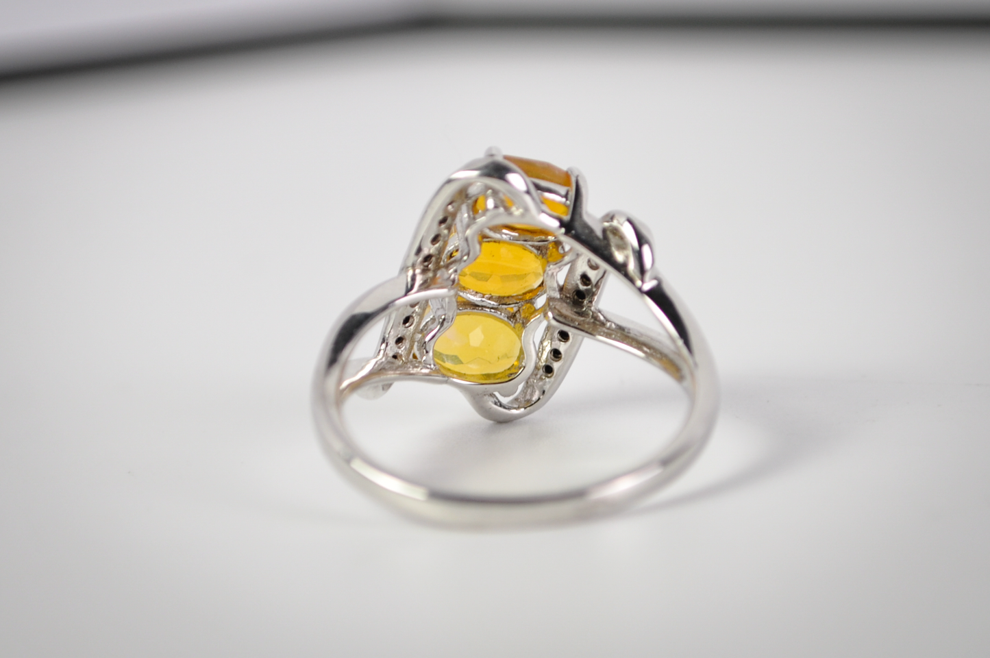 Three-Stone Yellow Gemstone Bypass Ring in 925 Sterling Silver, Size 8 - Sterling Silver Three-Stone Yellow and Black Accent Cocktail Ring