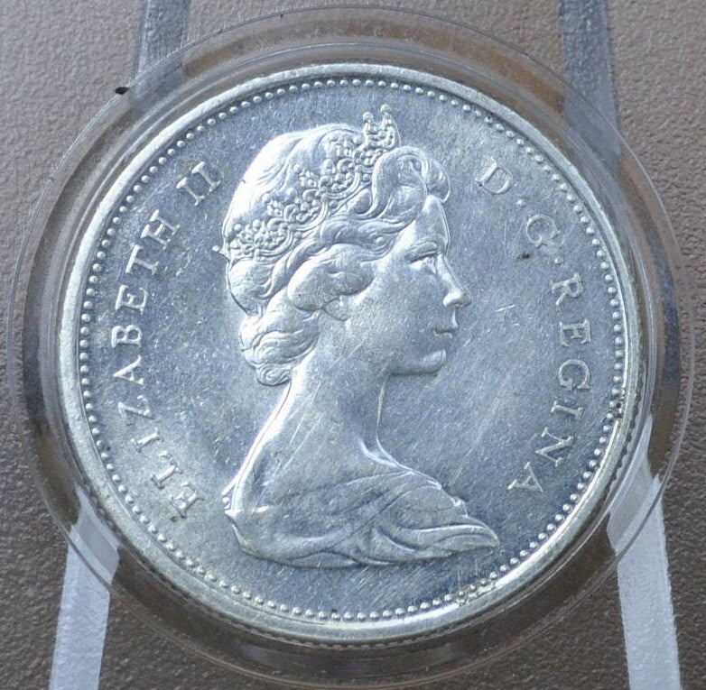 1967 Canadian Silver Quarter - BU (Uncirculated), Prooflike - 80% Silver - Queen Elizabeth II Silver Commemorative Quarter 1967 Canada